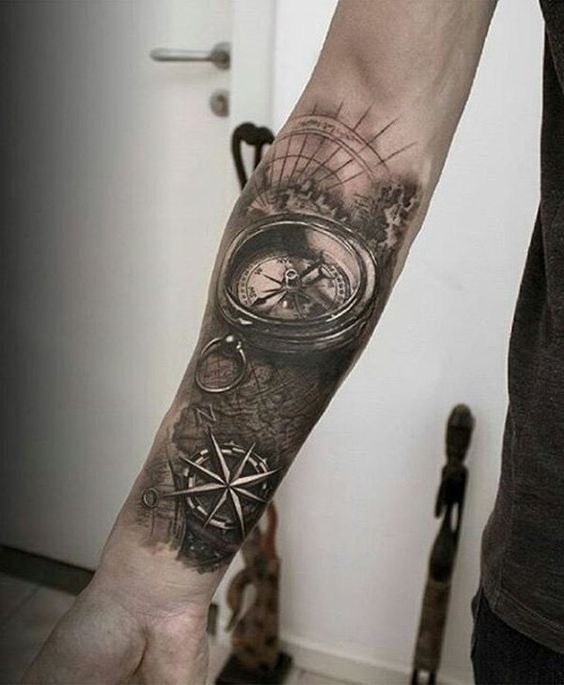 Compass Over an Antique Map forearm tattoo Tattoo Design