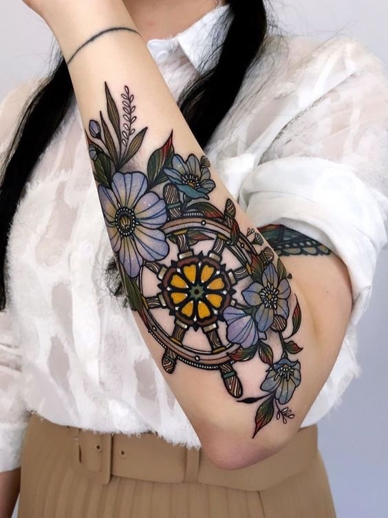 Flowers, Leaves, and a Ship’s Wheel Forearm Tattoos Tattoo Design
