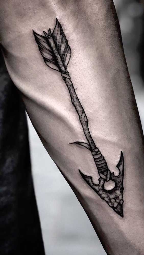 Primitive Black and White Arrow forearm tattoo Tattoo Design
