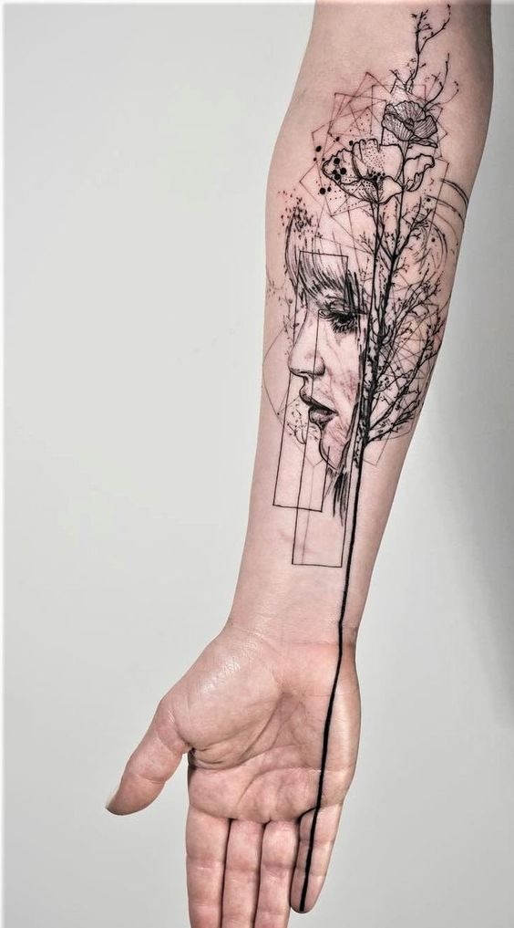 Profile of a Woman and Flowers forearm tattoo Tattoo Design