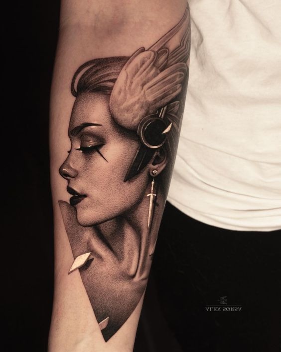 Profile of Woman with Sword Earring forearm tattoo Tattoo Design