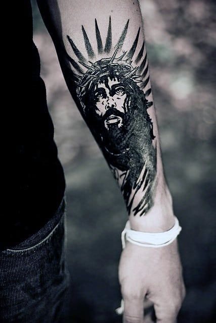Religious forearm tattoo with a Modern Style Tattoo Design
