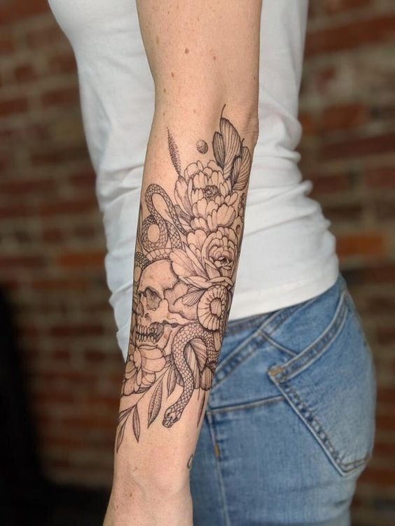 Skull and Flowers with Snake Forearm Tattoos Tattoo Design