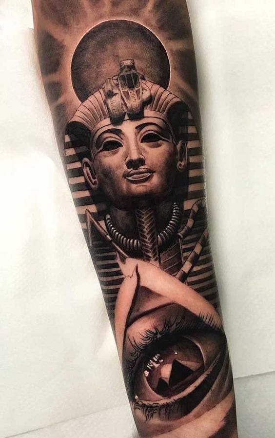 Tutankamun’s Burial Mask Over the All-Seeing Eye forearm tattoo Tattoo Design