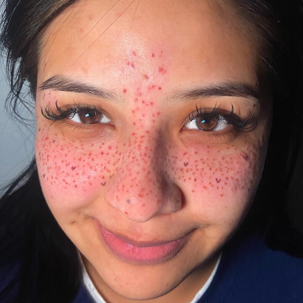 Fresh Light Red Freckles Tattoo with Soft Placement Tattoo Design