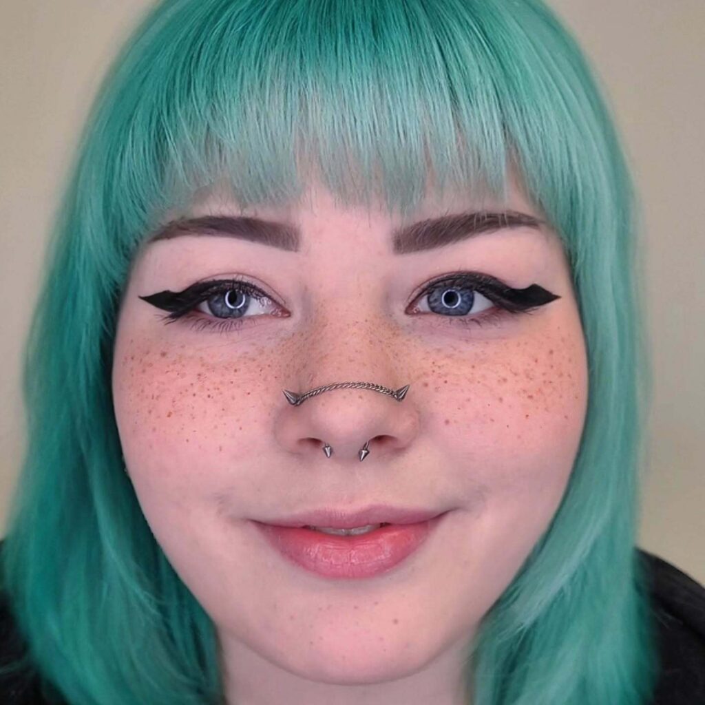 Playful Freckles Tattoo Across the Nose and Cheeks Tattoo Design