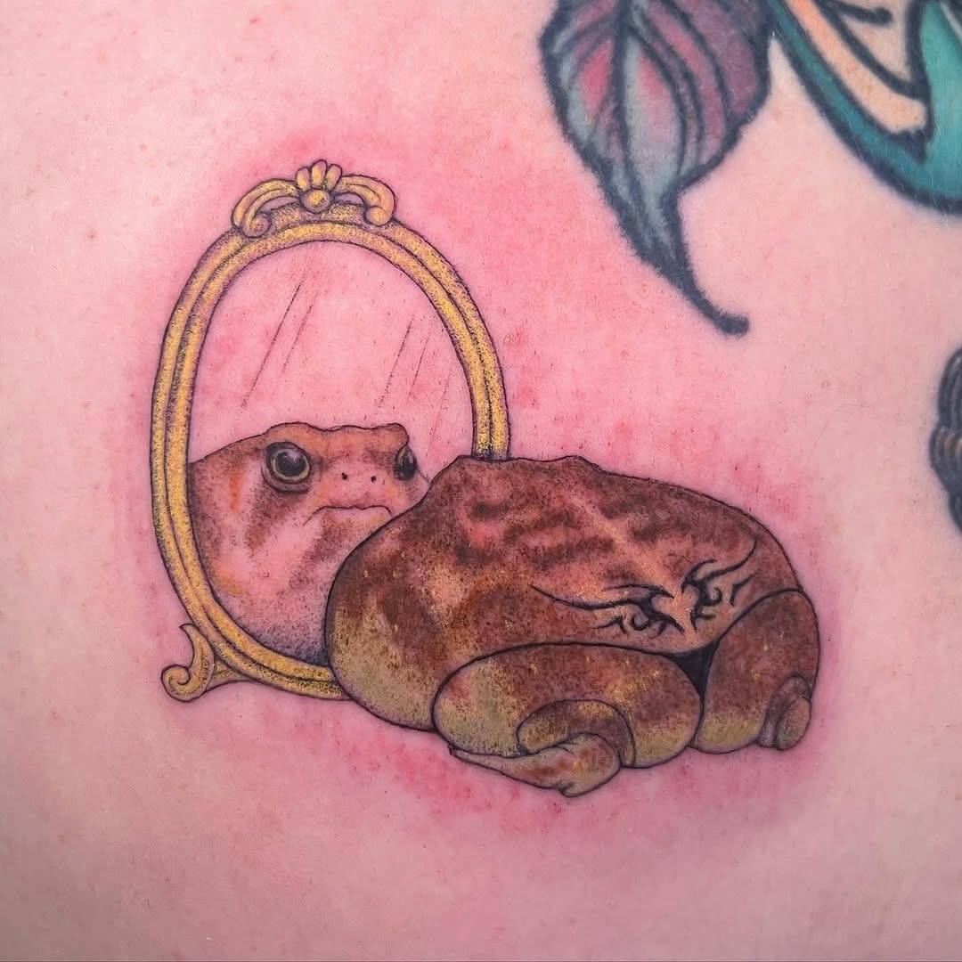 A whimsical frog tattoo reflecting self-love Tattoo Design