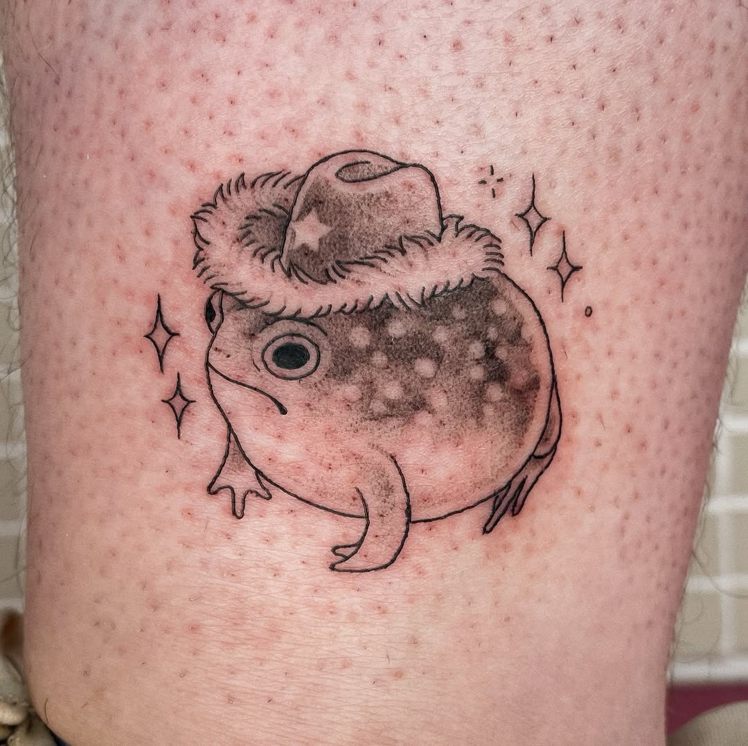 Charming frog tattoo wearing a cowboy hat Tattoo Design