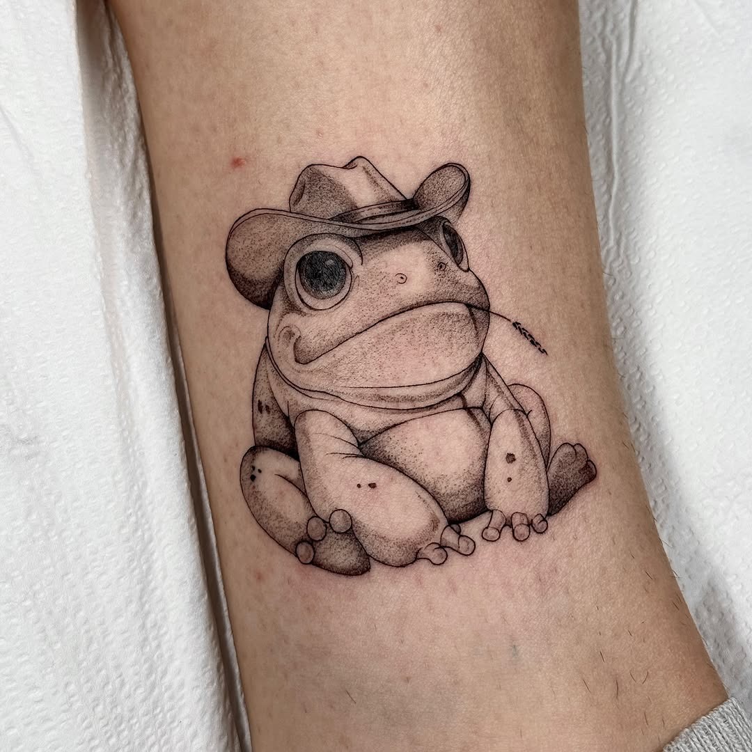 Charming frog tattoo with a cowboy hat Tattoo Design