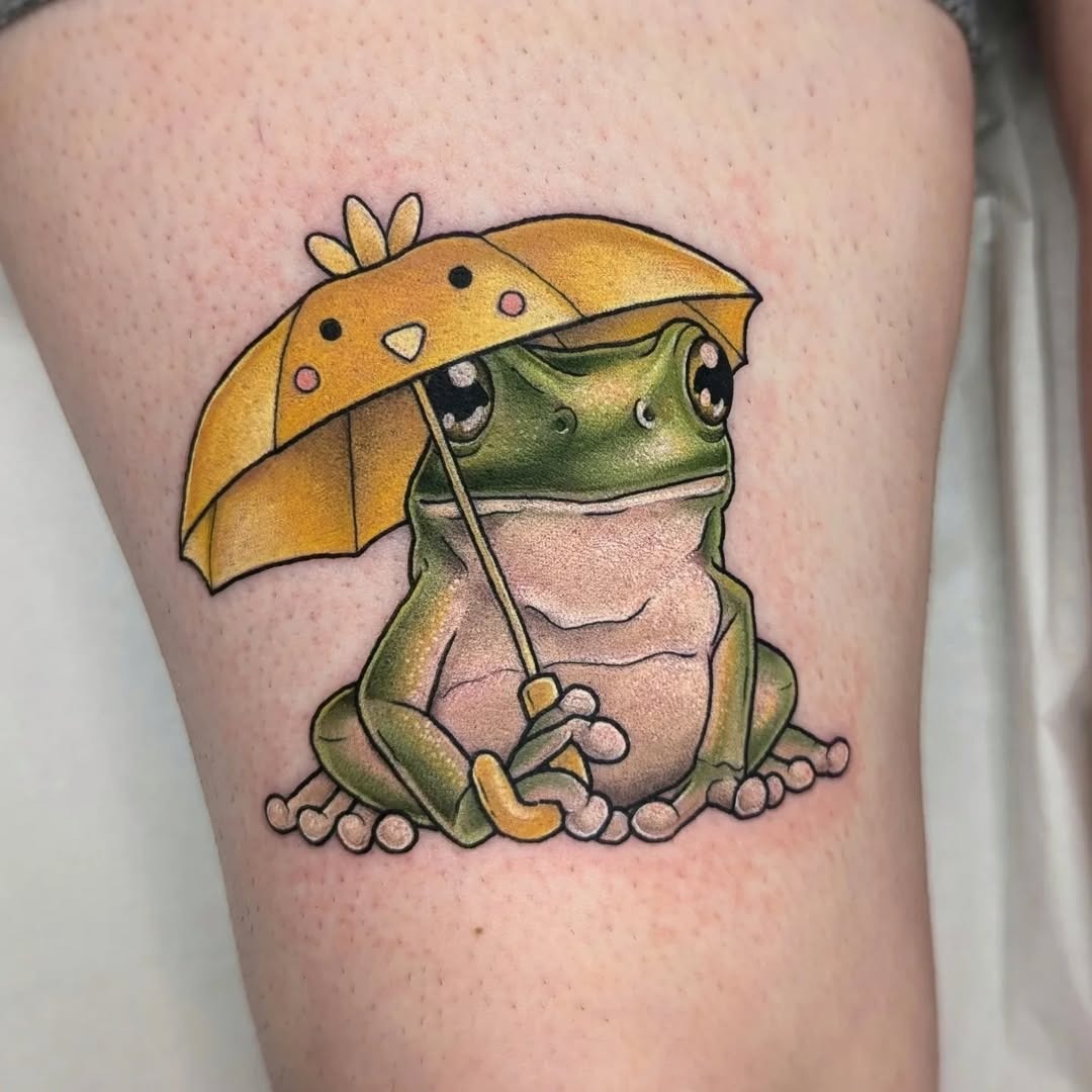 Charming frog tattoo with colorful umbrella design. Tattoo Design