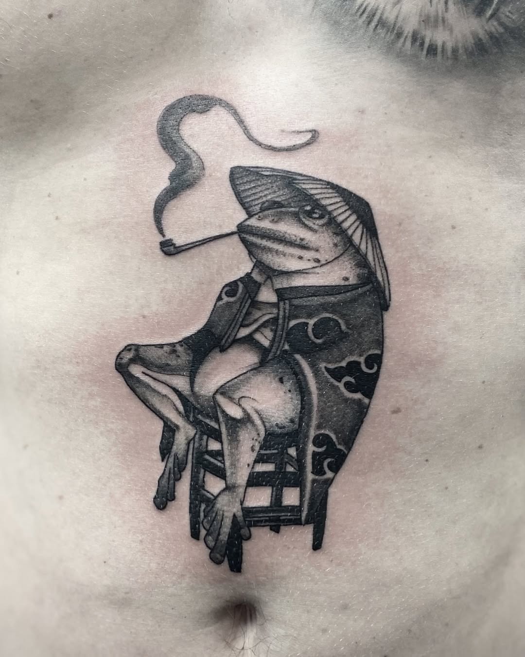 Charming Japanese-style frog tattoo with a twist Tattoo Design