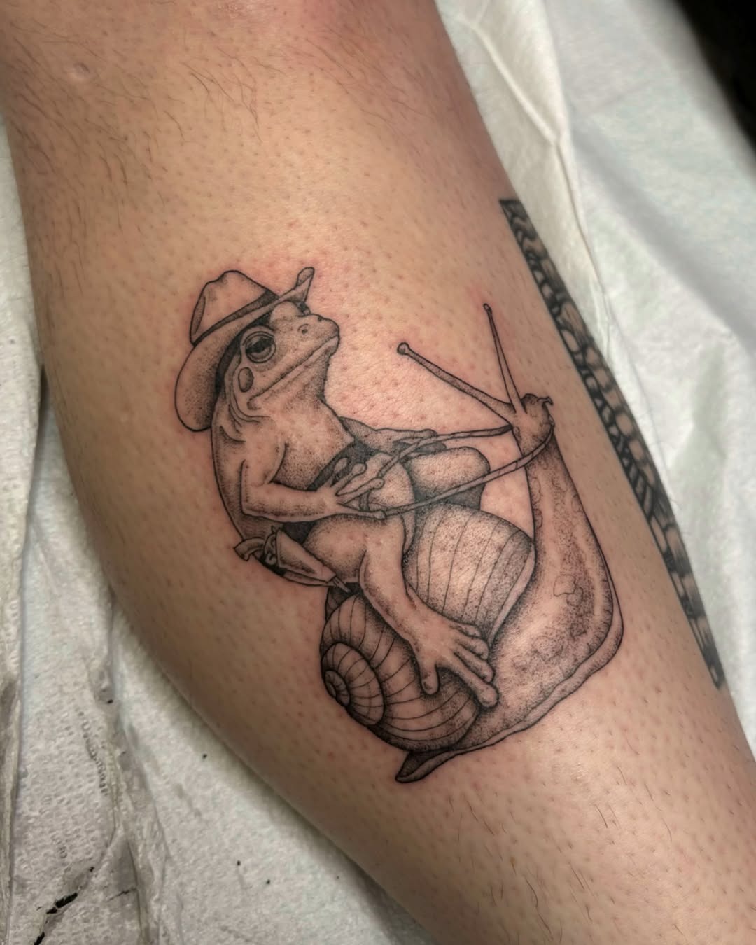 Frog tattoo with a playful cowboy twist Tattoo Design