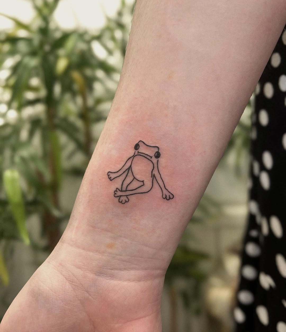 Minimalist Frog Tattoo on Forearm Tattoo Design