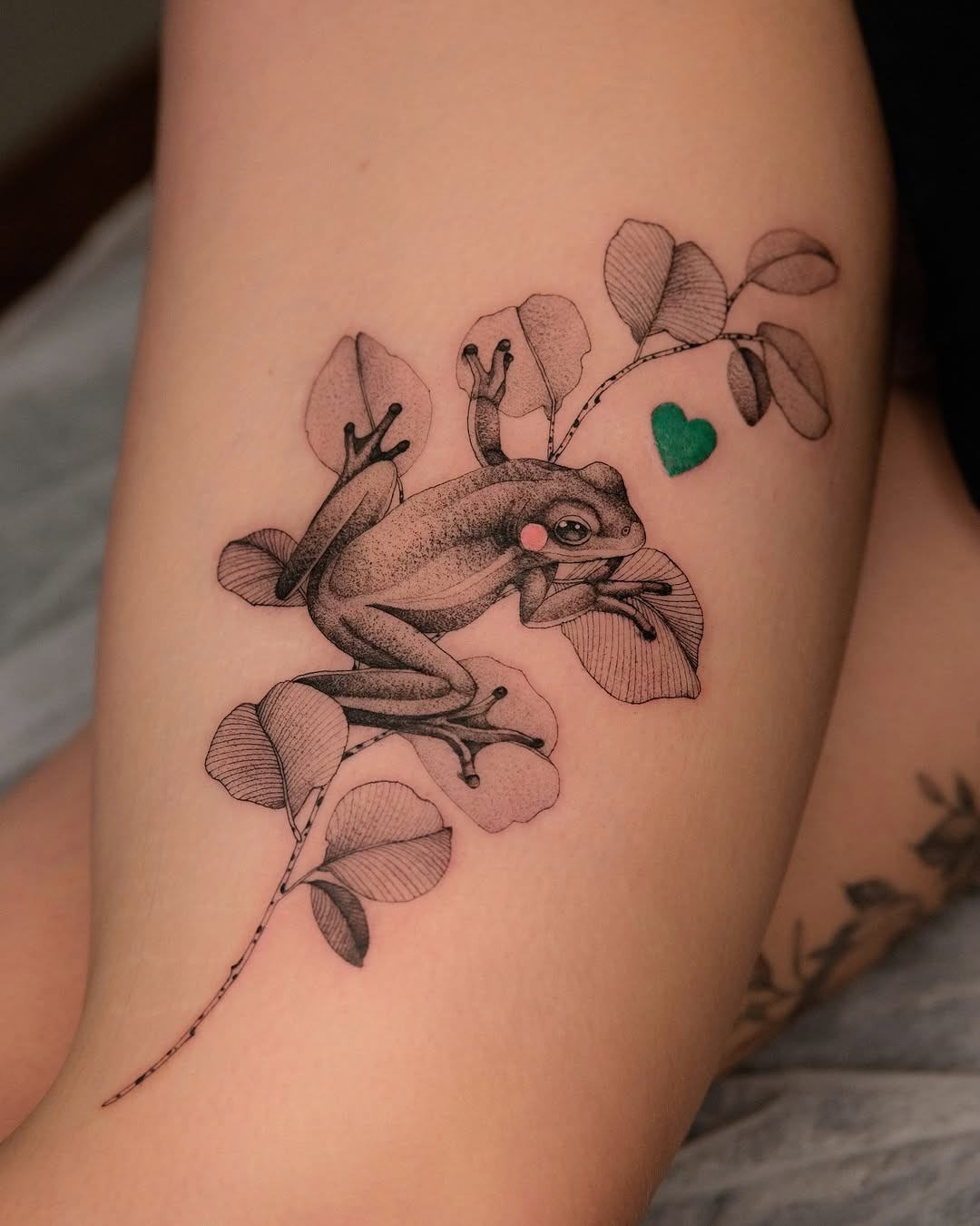 Stunning Frog Tattoo with Leafy Elements Tattoo Design
