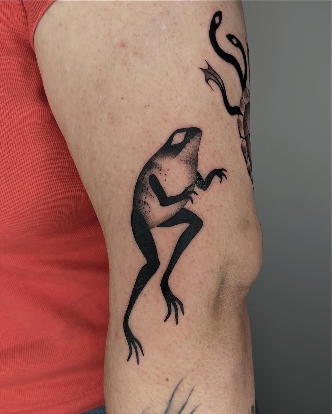 Stylish black ink frog tattoo on arm Tattoo Design