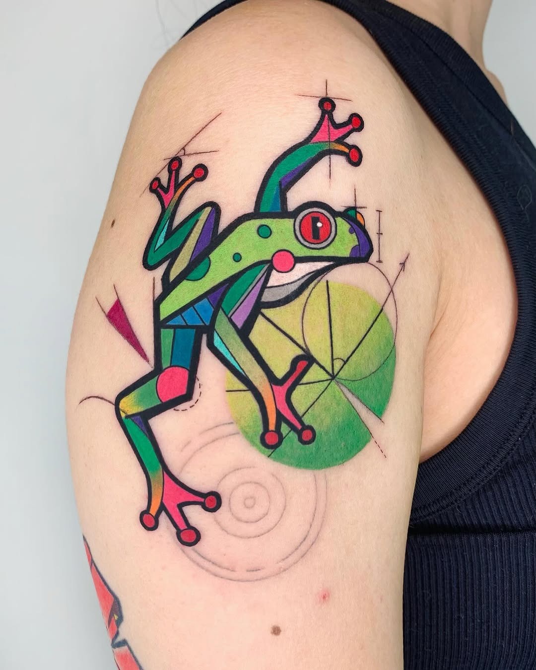Vibrant geometric frog tattoo captures playful essence Tattoo Design