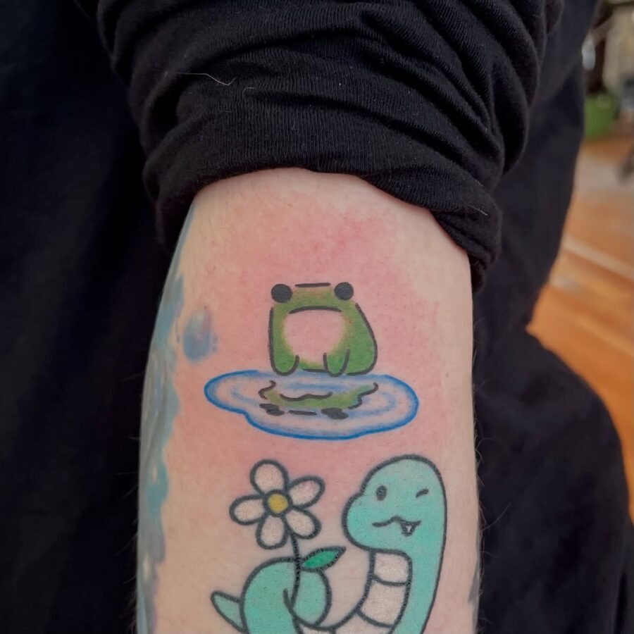 Quirky cartoon fish with a drink tattoo Tattoo Design