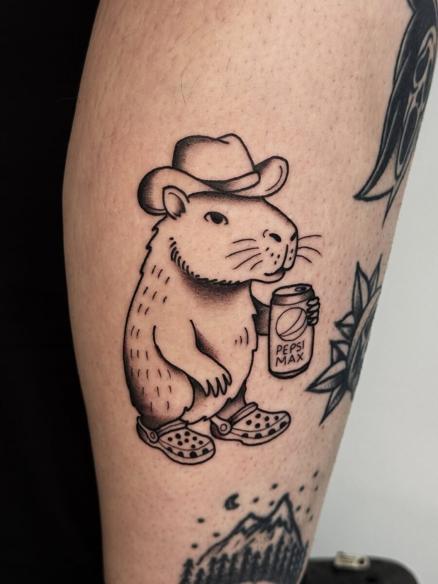 Whimsical banana tattoo brings smiles. Tattoo Design