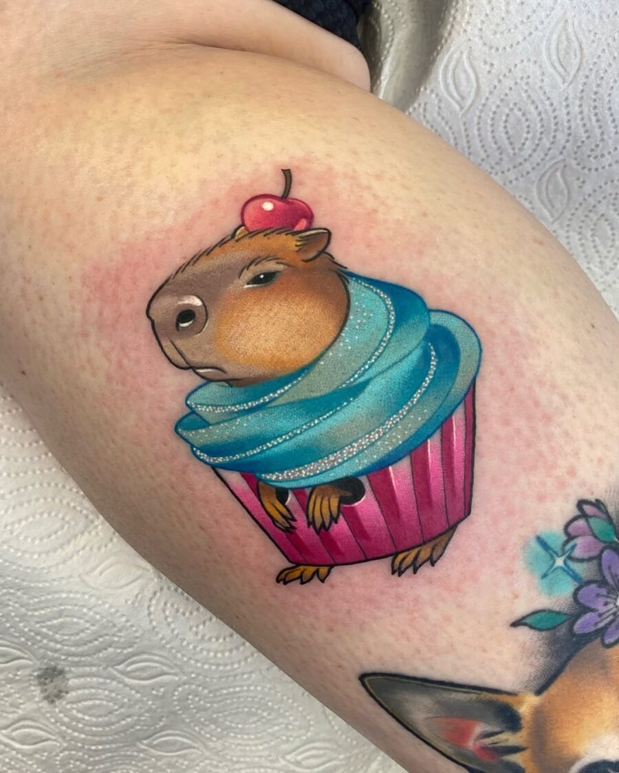 Whimsical squirrel enjoying a drink Tattoo Design