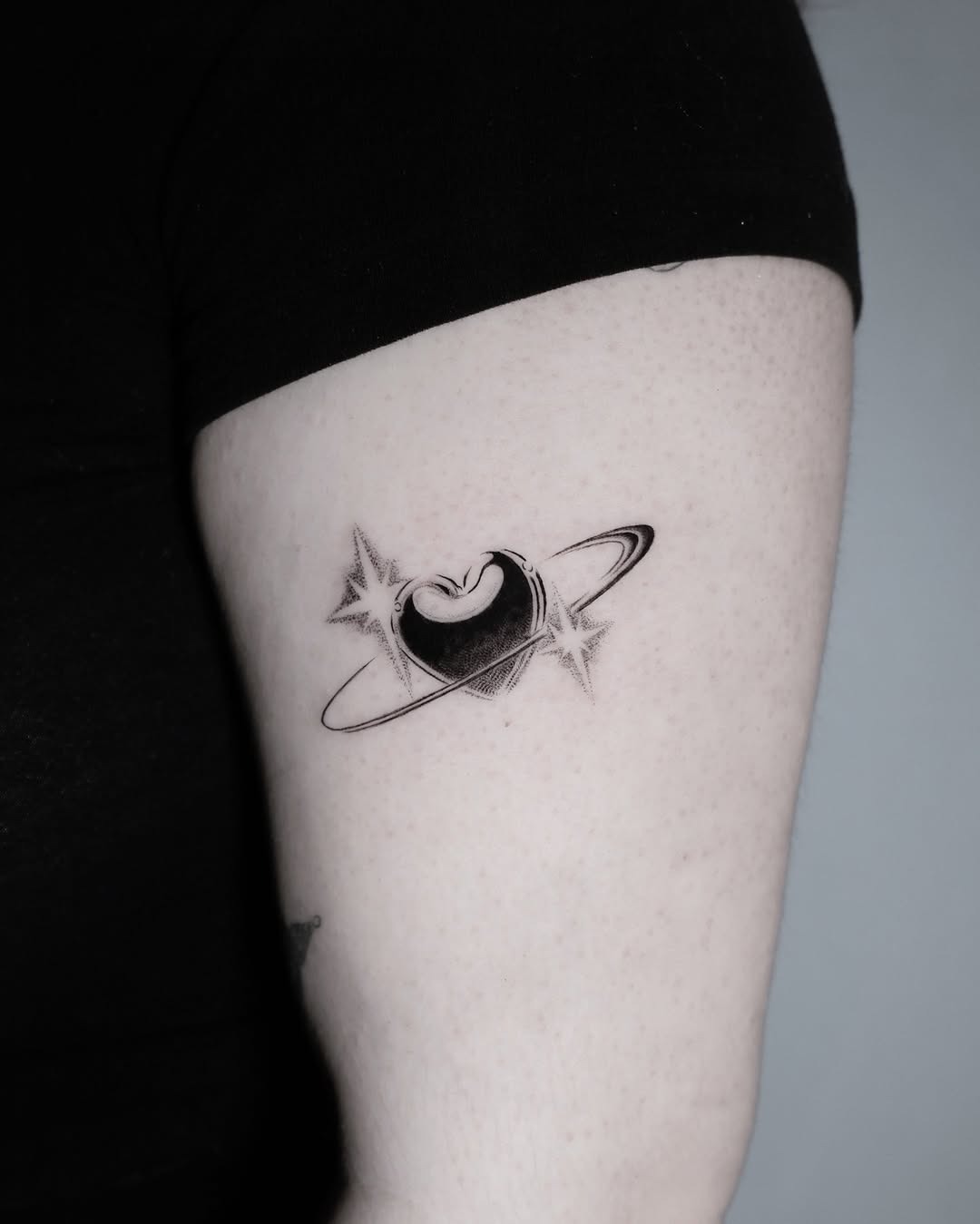 Celestial love etched in ink with planets. Tattoo Design