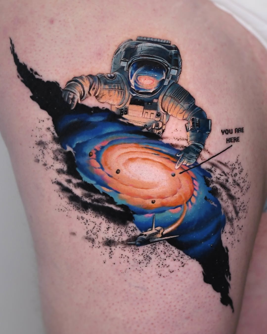 Cosmic astronaut tattoo exploring the universe Tattoo Design
