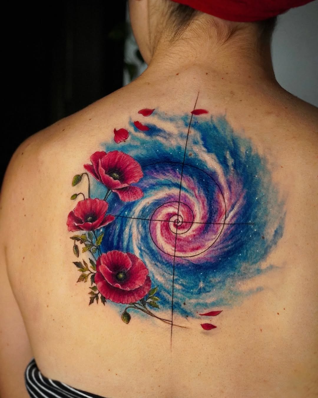 Stunning galaxy swirl with vibrant pink florals Tattoo Design