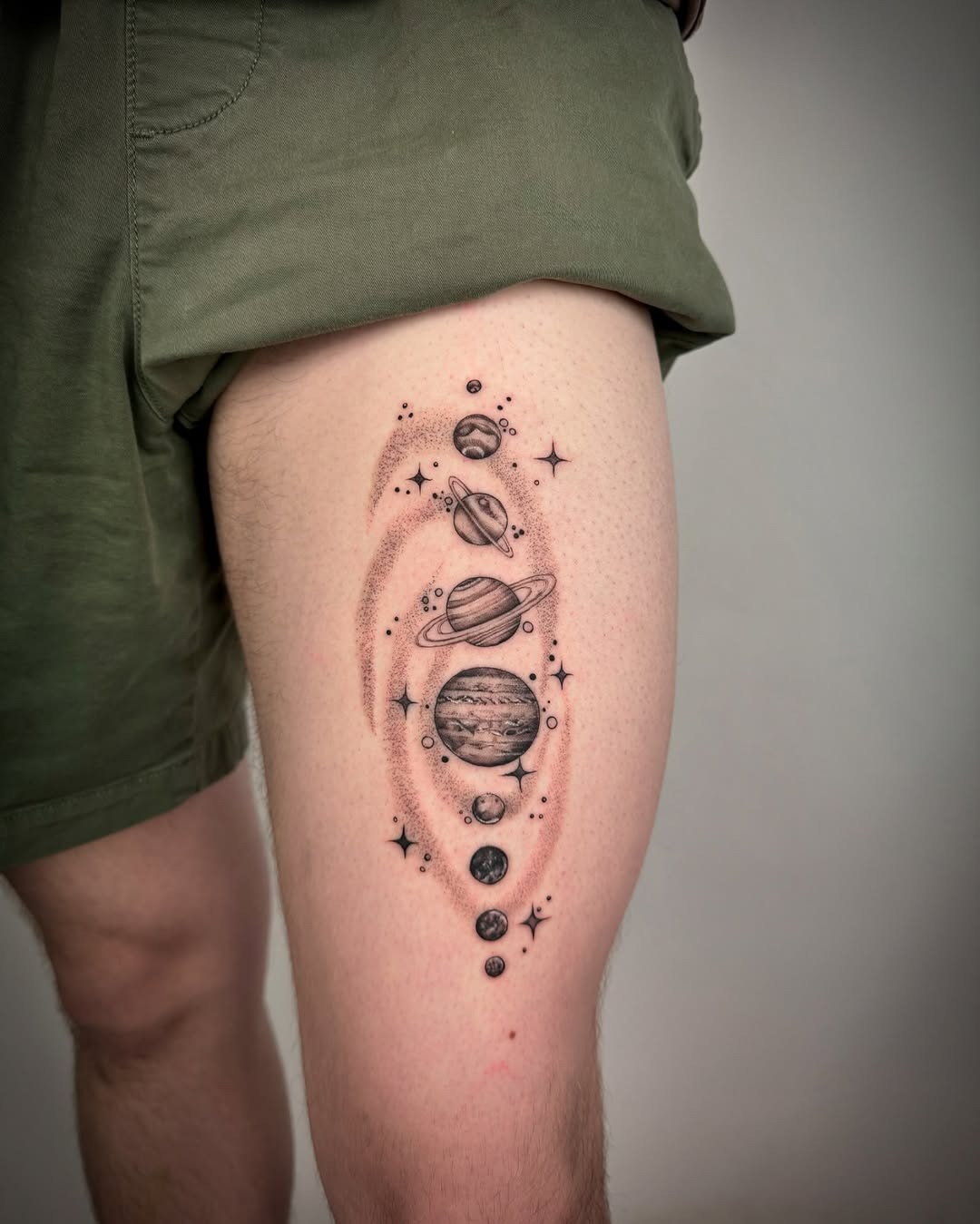 Stunning Space-Themed Tattoo on Thigh Tattoo Design