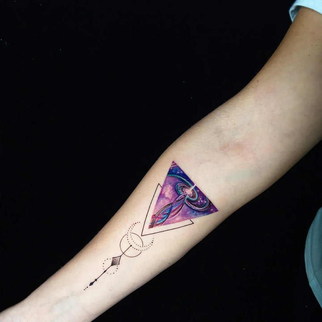 Vibrant Galaxy Triangle Tattoo on Forearm Tattoo Design