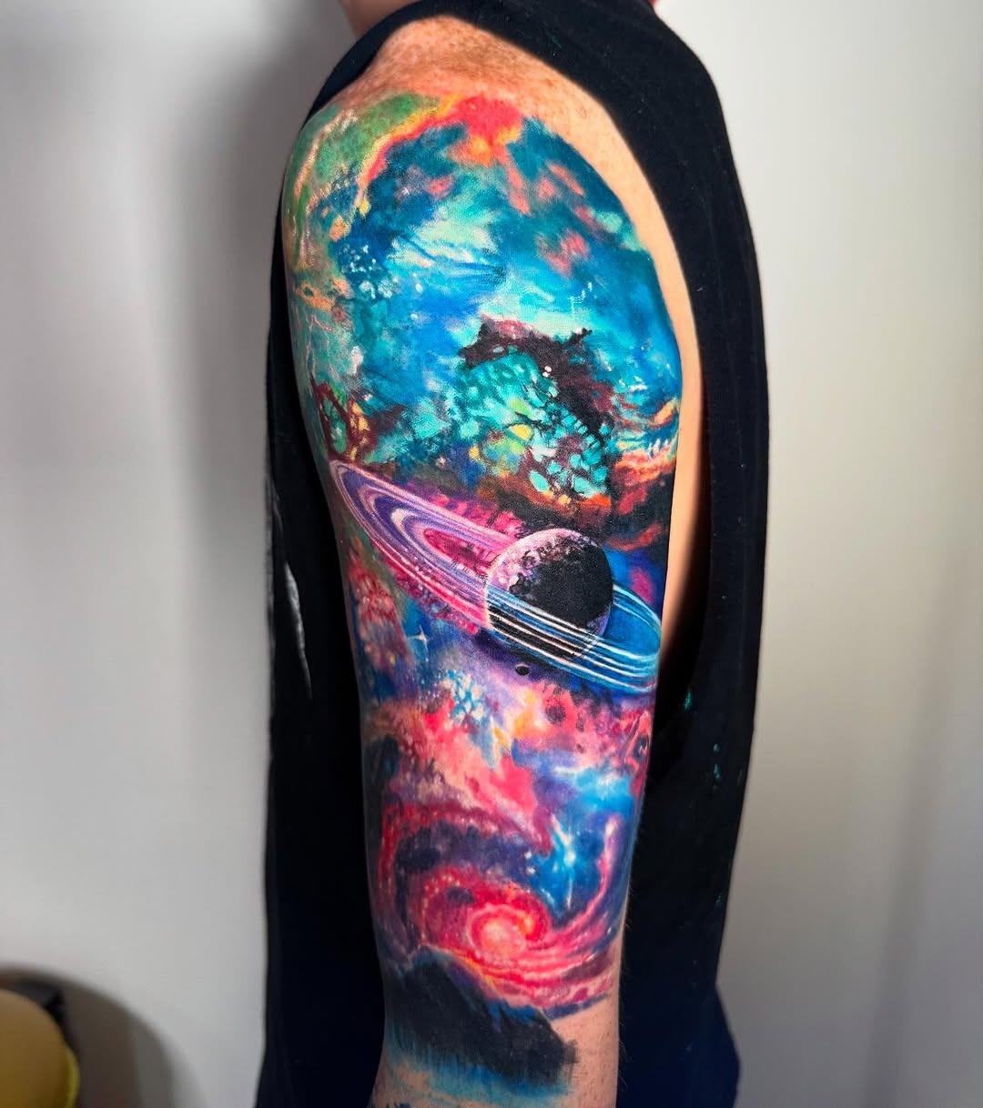 Vibrant Tattoo of Space and Planets Tattoo Design