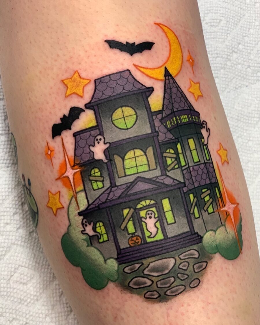 Charming haunted house tattoo with playful ghosts Tattoo Design
