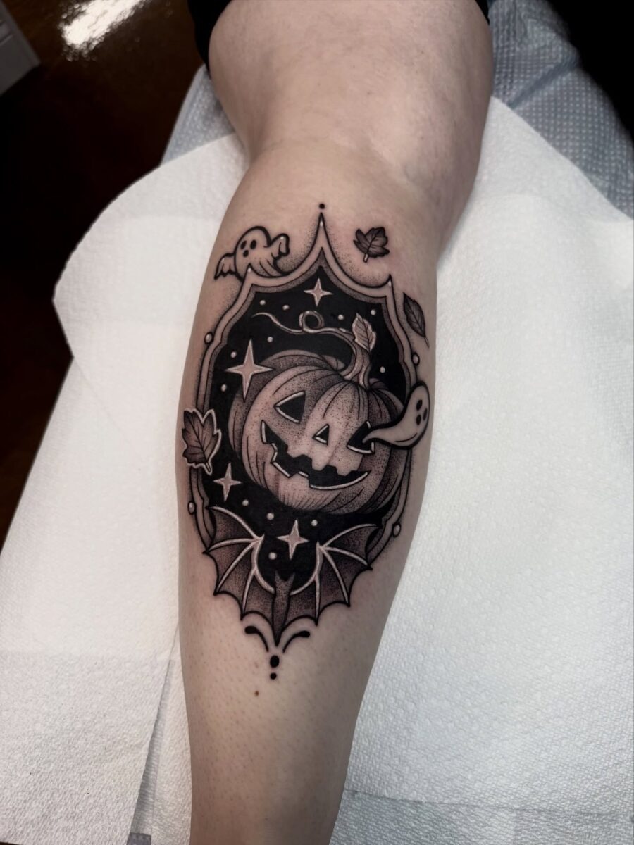 Charming pumpkin and ghost tattoo design Tattoo Design