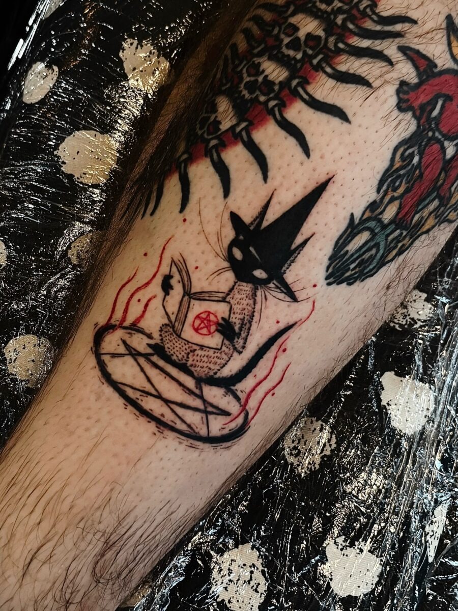 Charming witch cat casting a spell tattoo Tattoo Design