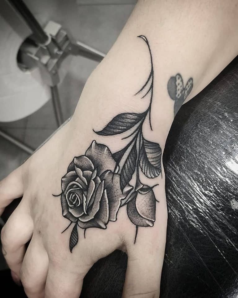Beautiful Black and White Rose Hand Tattoo Tattoo Design