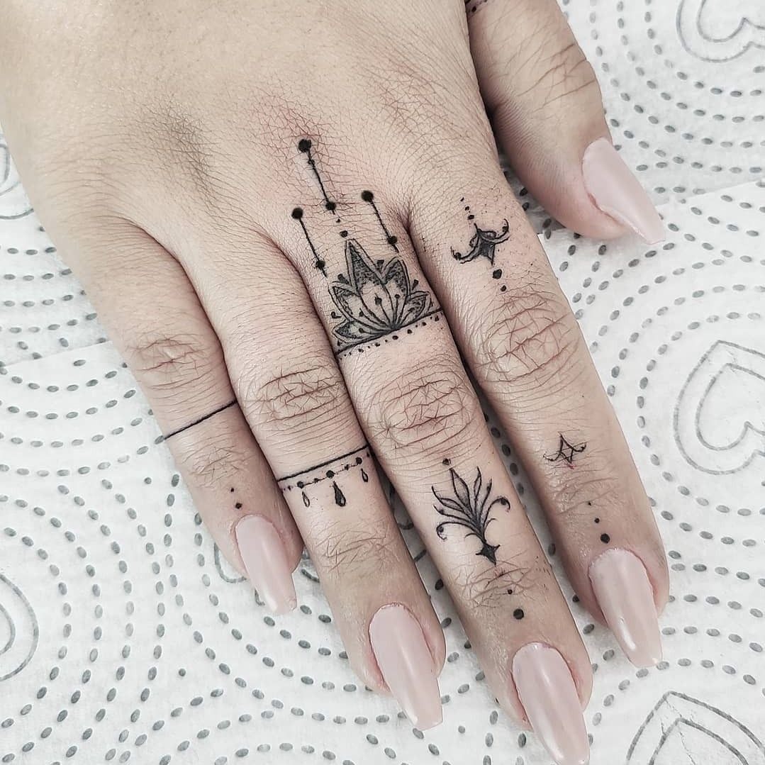 Elegantly Simple Black Finger and Hand Tattoos Tattoo Design