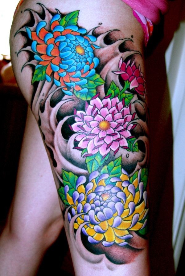 Colorful Chrysanthemum Trio with Flowing Background Tattoo Design