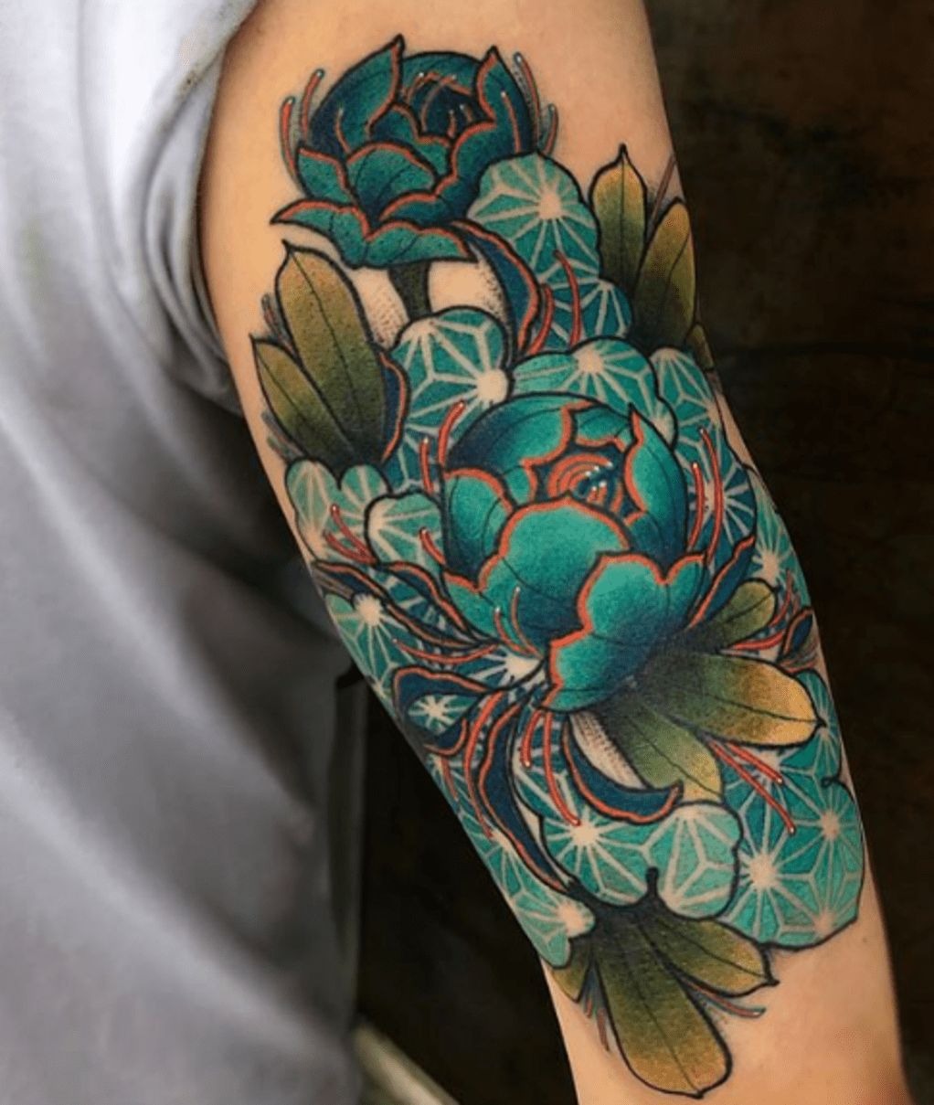 Floral Sleeve with Cherry Blossom Accents Tattoo Design