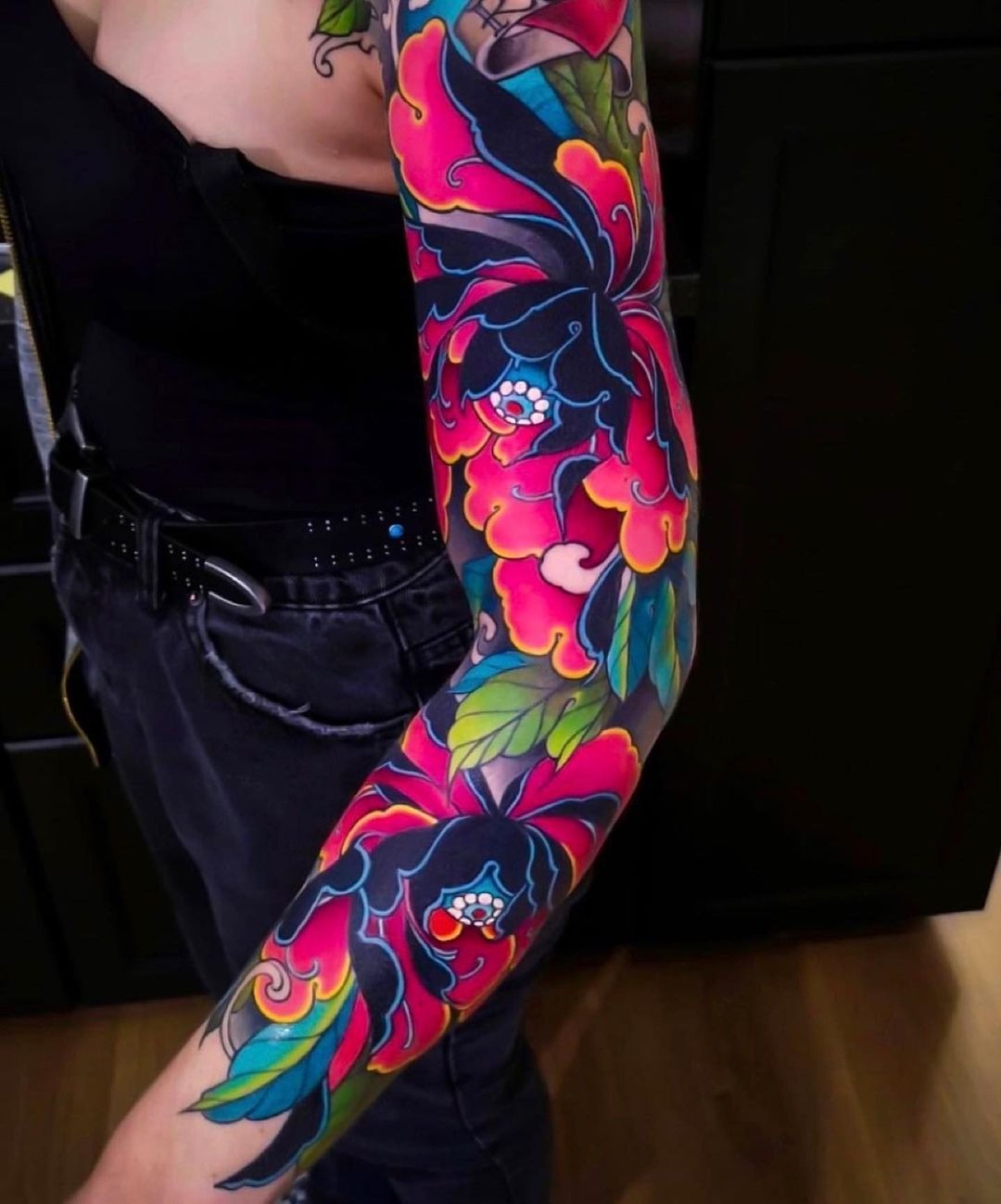 Minimalist Black Flower with Rising Sun Tattoo Design
