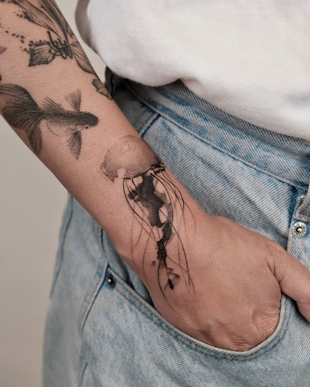 Delicate jellyfish tattoo with artistic flair Tattoo Design