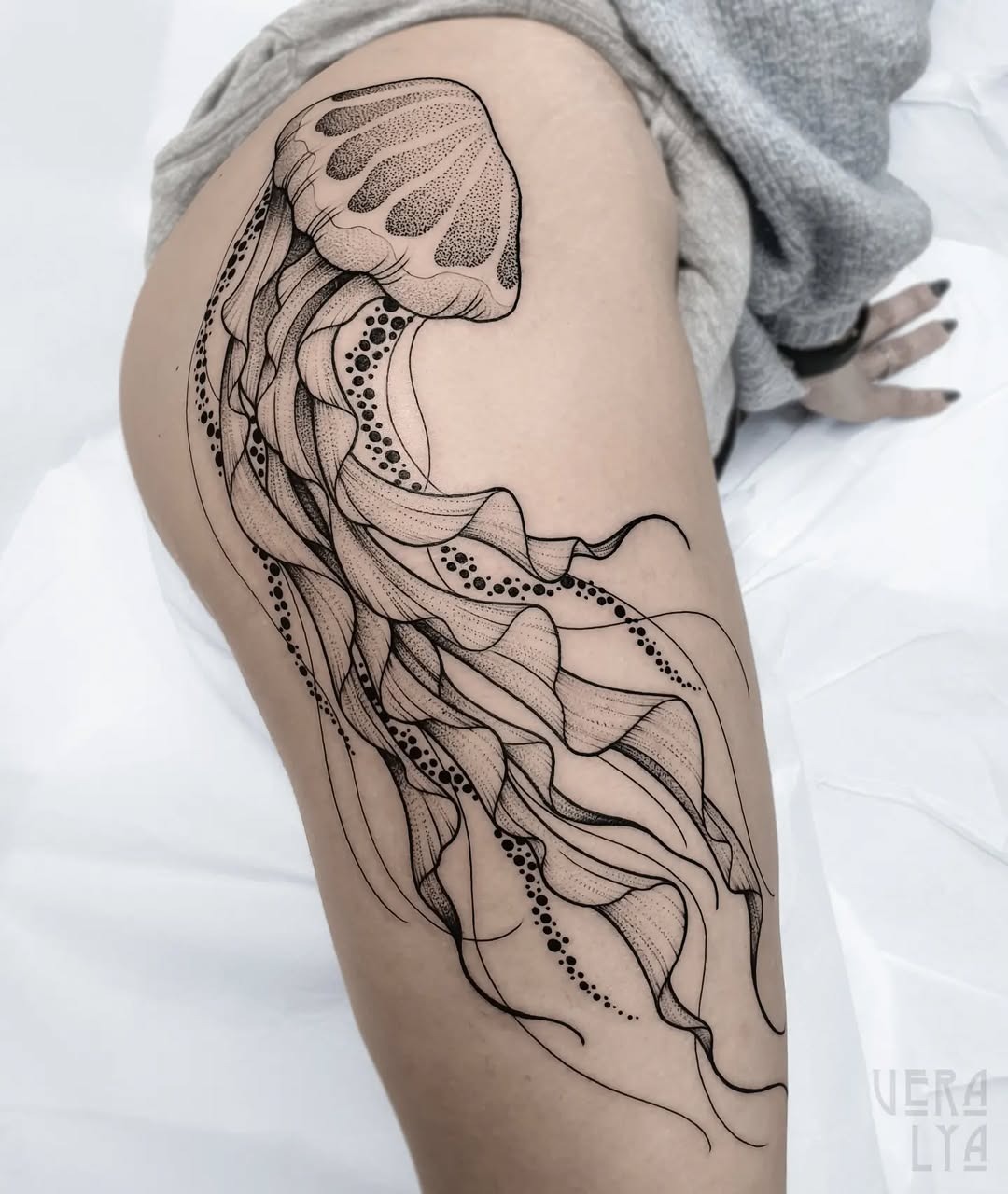 Elegant jellyfish tattoo featuring intricate line work Tattoo Design