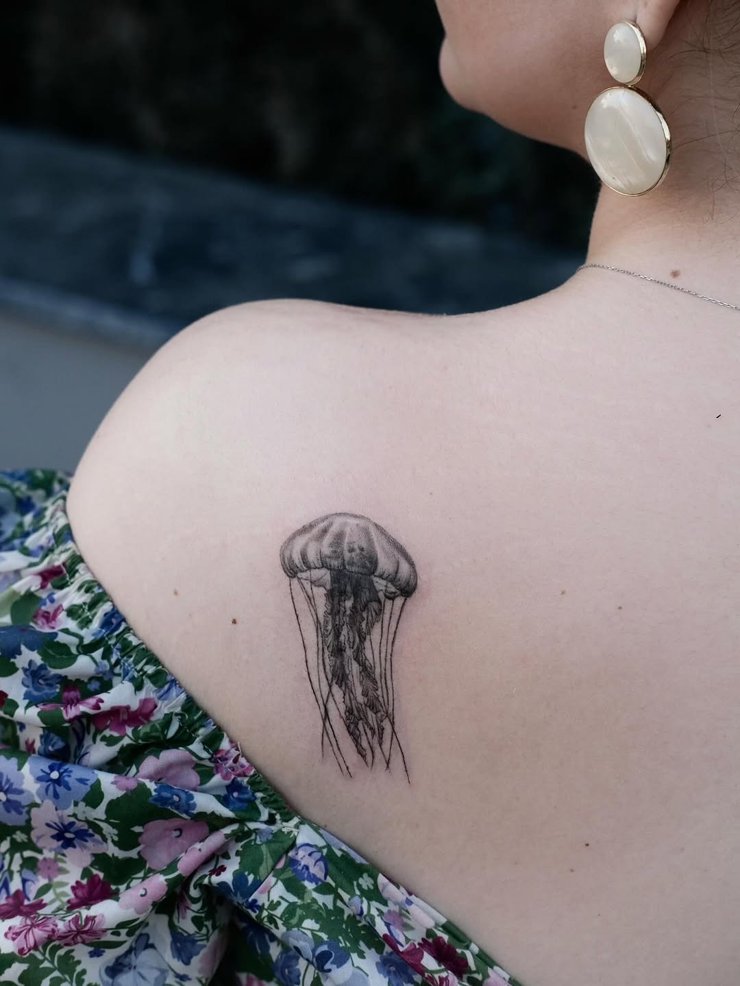 Elegant jellyfish tattoo on shoulder decor. Tattoo Design