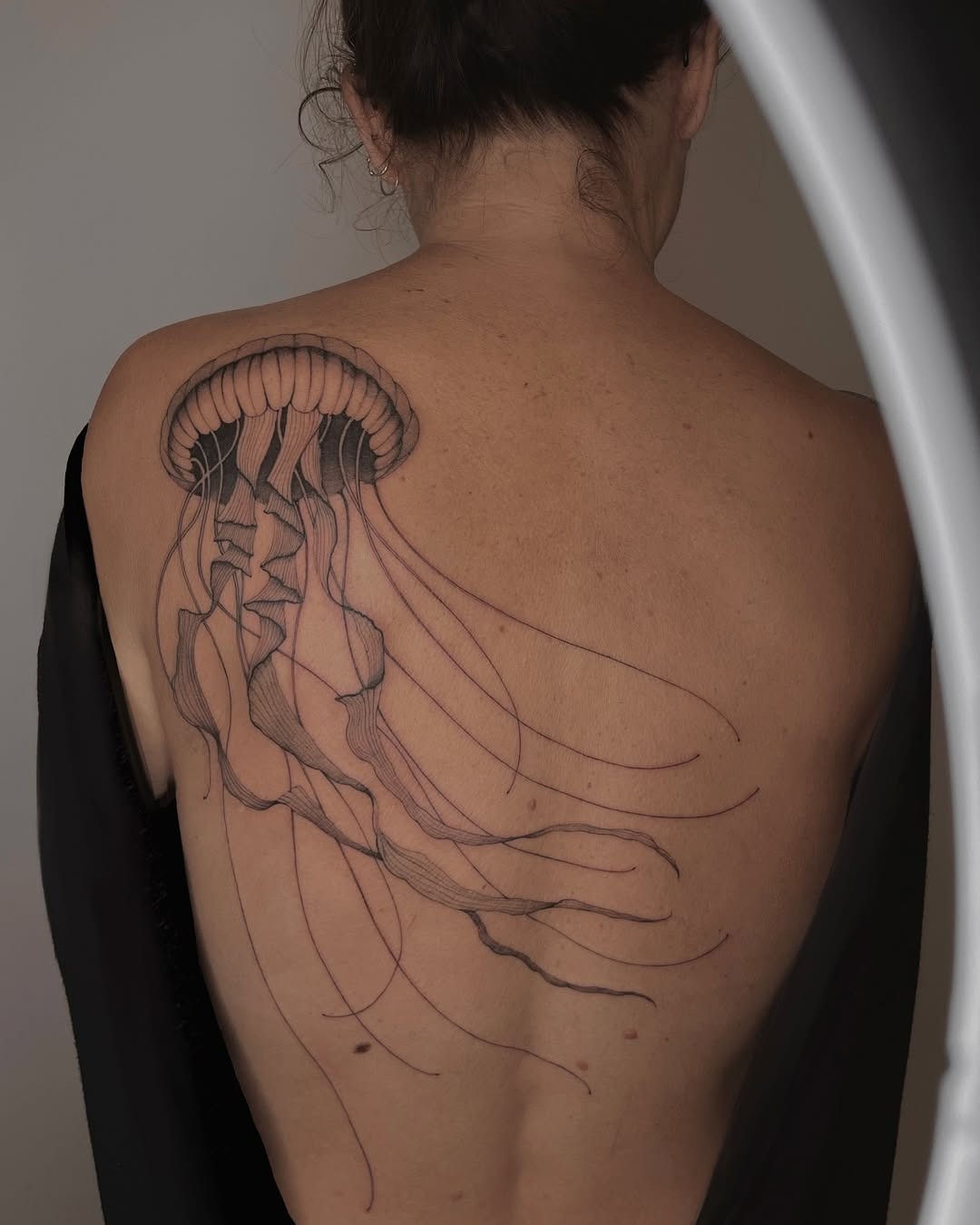 Elegant Jellyfish Tattoo on the Back Tattoo Design