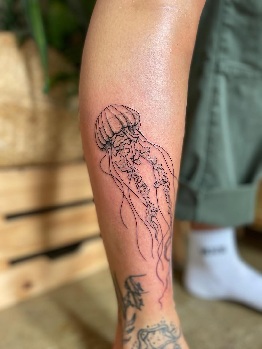 Elegant jellyfish tattoo showcasing minimalist design Tattoo Design