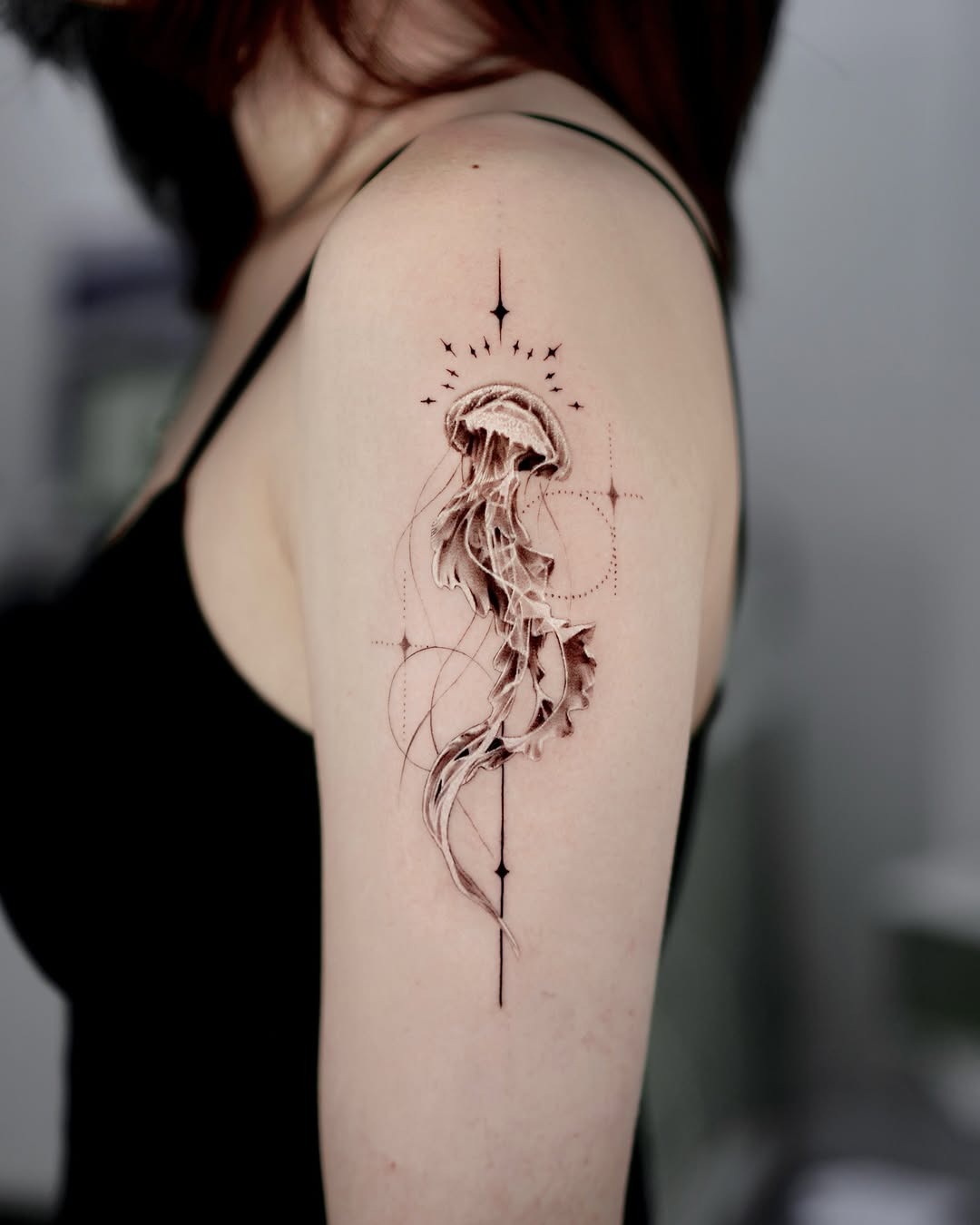 Elegant jellyfish tattoo with geometric accents Tattoo Design