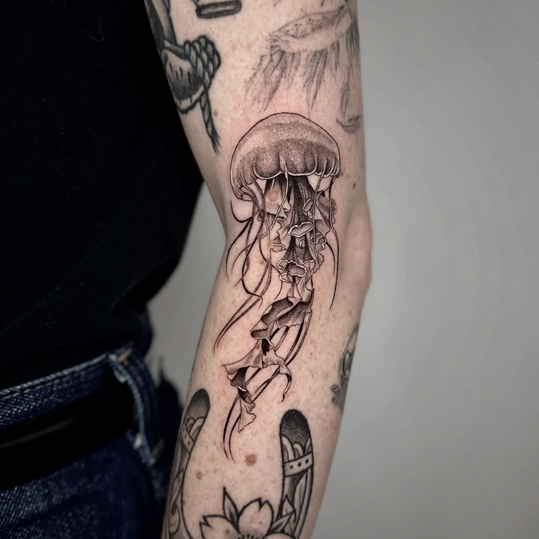 Mesmerizing jellyfish ink art on skin Tattoo Design