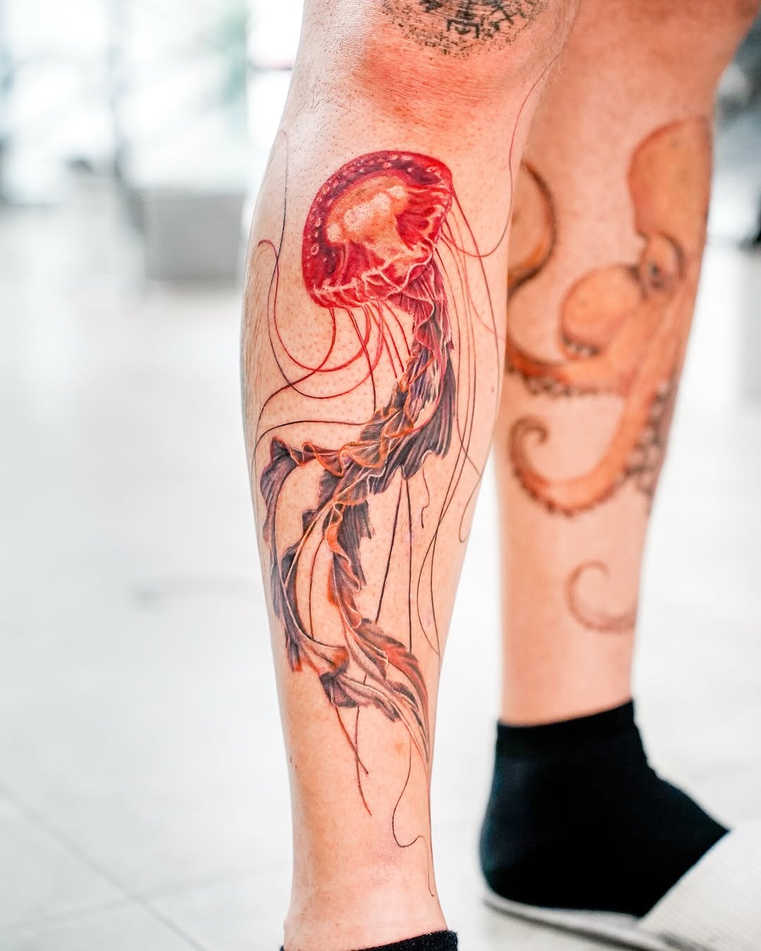 Stunning jellyfish tattoo showcasing vibrant colors Tattoo Design