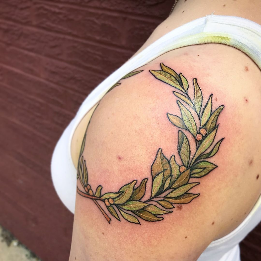Initial in Laurel Back Emblem Tattoo Design