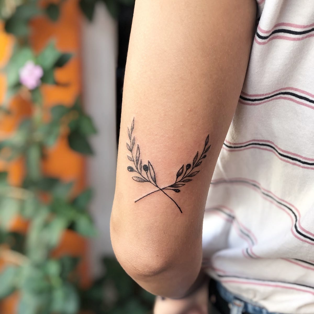Latin Quote Laurel Forearm Emblem Tattoo Design
