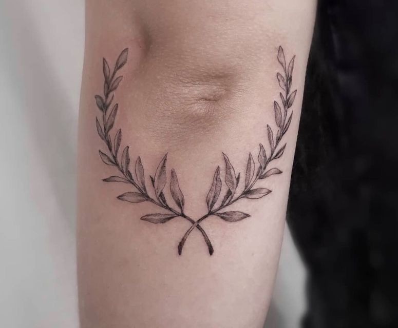 Regal Chest Laurel Wings Tattoo Design