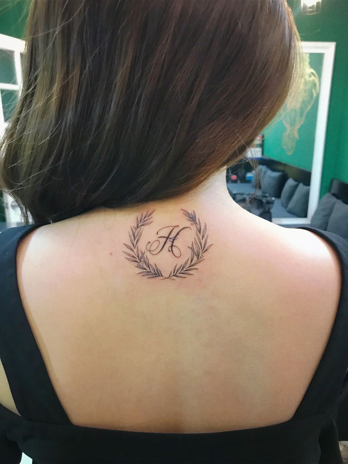 Symmetrical Chest Laurel Garland Tattoo Design