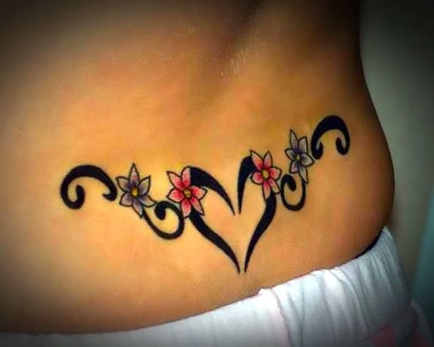Combining flowers and a black heart motif, this design captures a blend of romance and elegance.